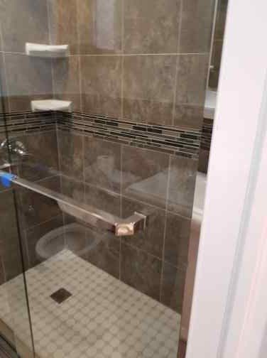Bathroom remodel with tile shower by Shaara Contracting Inc in Brooklyn, NY