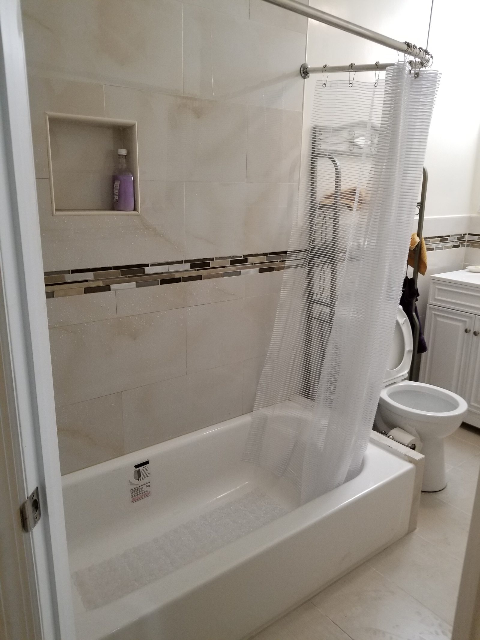 Bathroom tile and vanity remodel by Shaara Contracting Inc