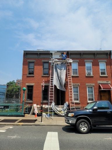 Brownstone stoop and stair masonry by Shaara Contracting Inc